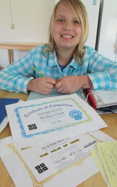 Alexis Nulty, 12, recently won two awards for computer coding projects at her school. She is thriving in the stability offered at the Booth Family Center for the homeless.