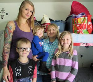 Brittany Kerr and her children, Athan, Ayla, Alexis and Aylissa, thrive in the stability provided by Booth Family Center.