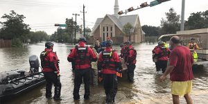 Responders affiliated with Lutheran Disaster Response amid Houston-area floodwaters brought by Hurricane Harvey.
