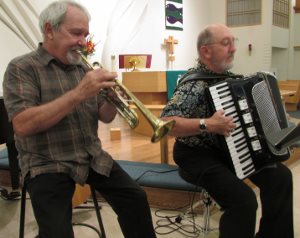 PEACE member Joe Souza, on trumpet, and Dave Fenolio, on accordion, from the Cracker Jack Jazz Band, performed during the Texas Hurricane Fundraising Concert benefitting relief and rebuilding in the Houston area.