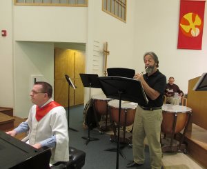 PEACE organist Walt Strony and member Phil Richardson offer special music during the celebration of Reformation Sunday.